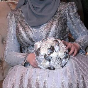 Silver/gray gown. Willing to negotiate!